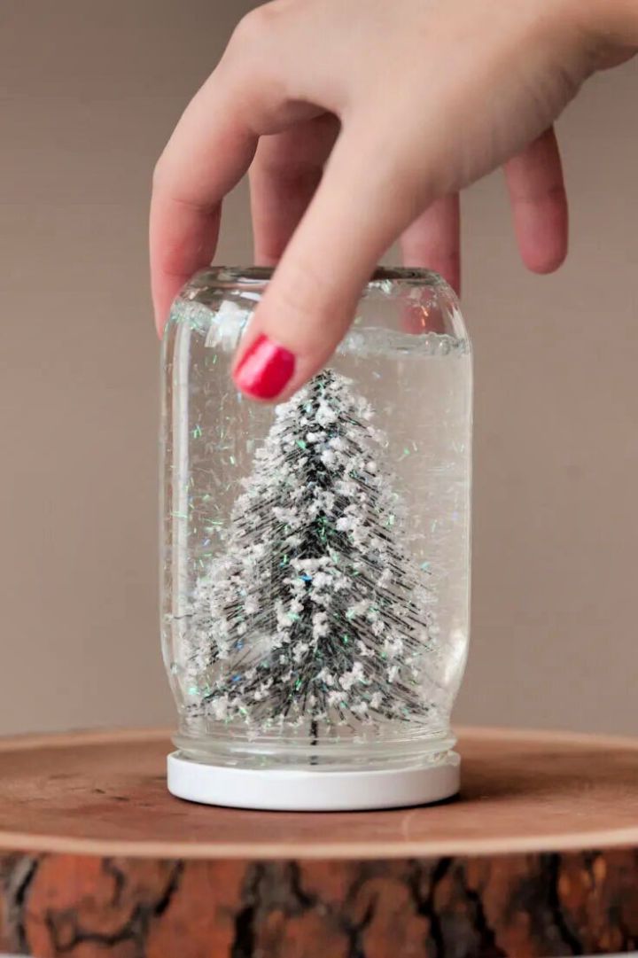 DIY Snow Globe - the easy way! - Messy Little Monster